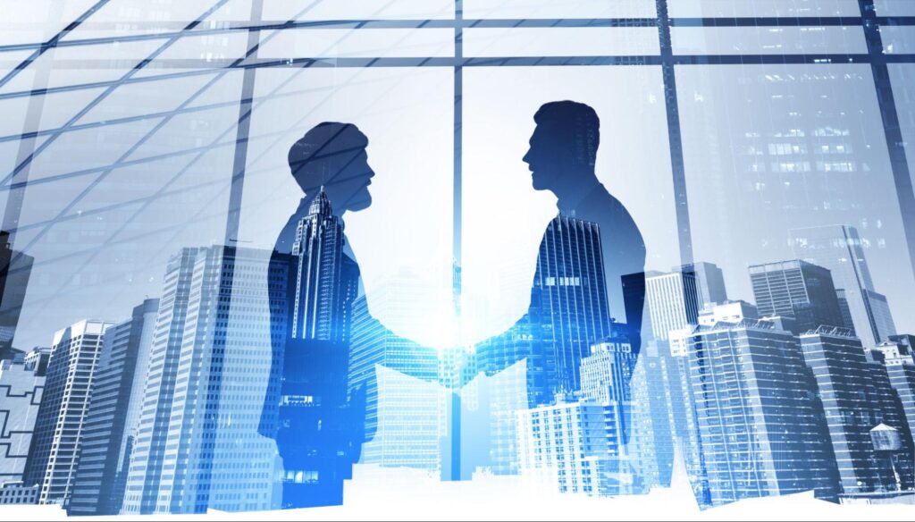 Business partners shaking hands