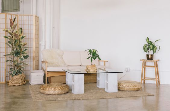 Concrete glass coffee table with a stool around