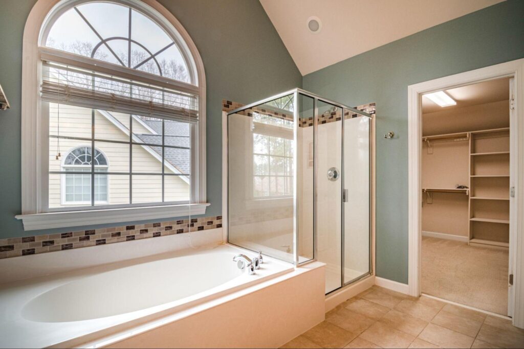 Fiberglass shower door with bath tub