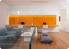 Ideas and maintenance tips for using glass backsplashes in kitchens