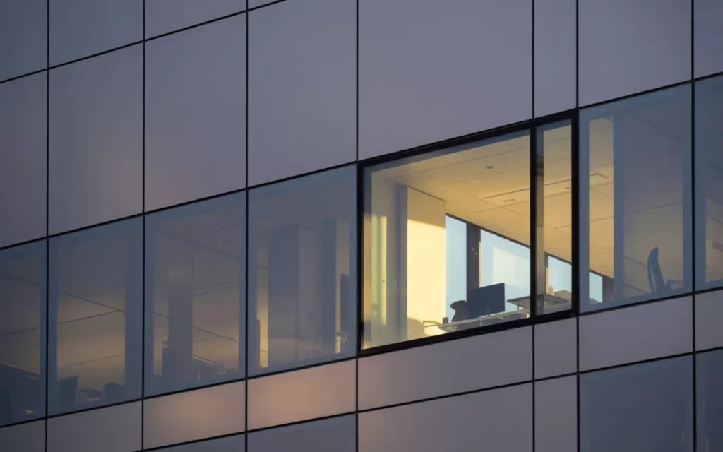 Mirrorpane tempered glass façade and interior windows showing one-way reflection, privacy, and modern architectural style.