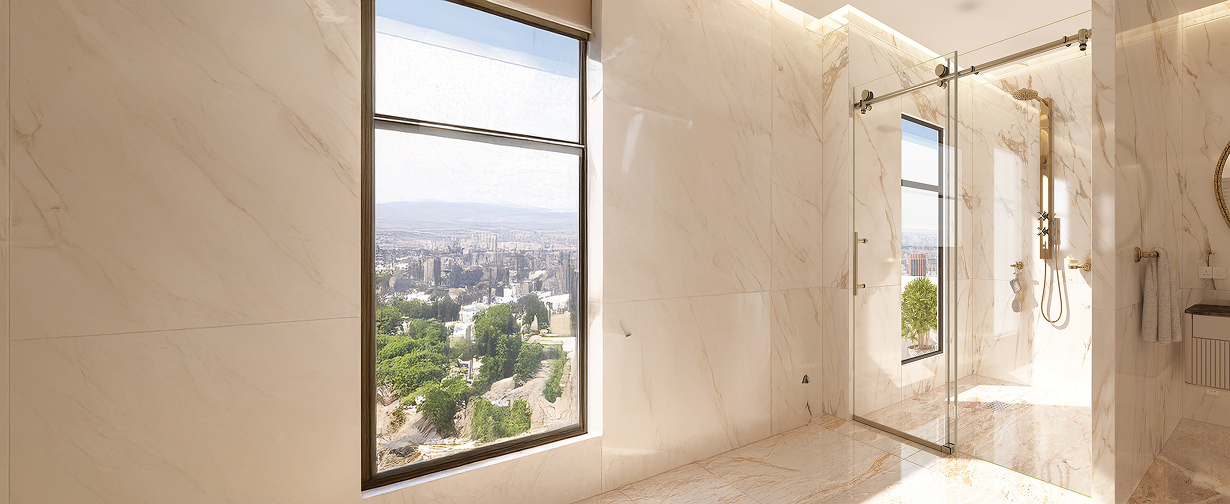 Luxurious marble bathroom with frameless shower glass doors and panoramic city view, featuring modern walk in shower doors.