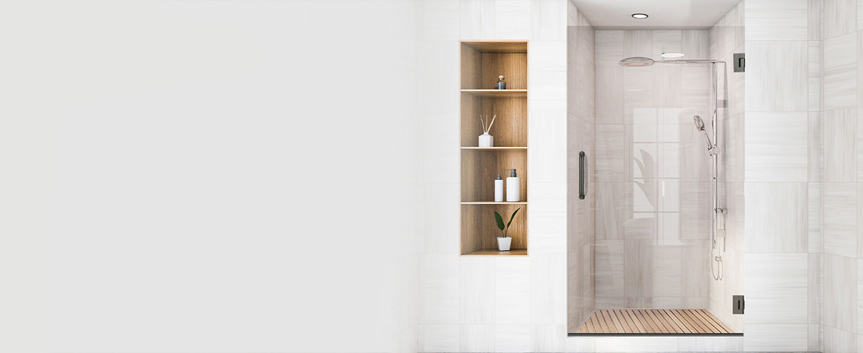 Minimalist bathroom design with clear shower glass door and built-in wall shelves, highlighting elegant shower doors.