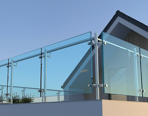 Modern balcony railing with transparent blue tempered glass panels.
