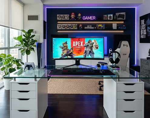 Glass top for Alex drawers on gamer desk with RGB lighting and Apex Legends monitor