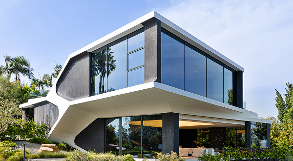 Striking contemporary house featuring large Greylite II Tempered Glass windows and sleek facade