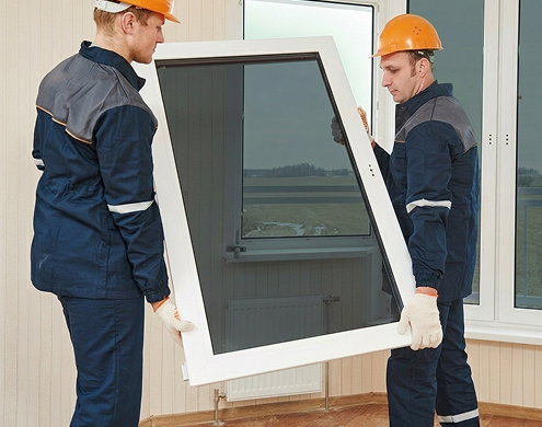 Professional installation of Greylite II Tempered Glass window by skilled workers