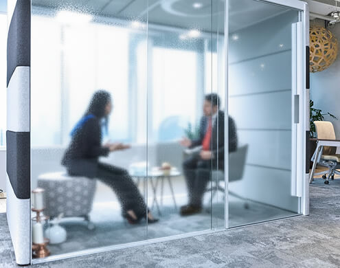 Elegant office with Spraylite tempered glass partition wall for stylish workspace division