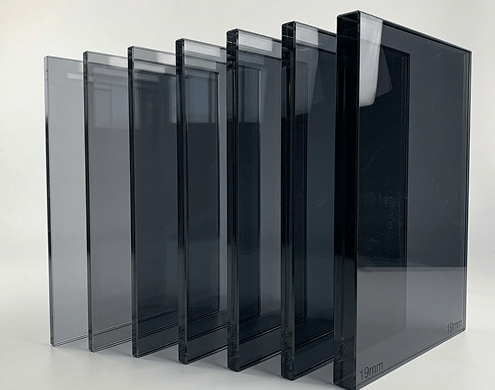 Super Grey glass panels in different thicknesses showing deep tint and clarity.