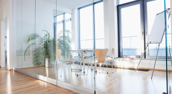 Bright modern office featuring large Ultra Clear tempered glass partitions and windows for ultra-clear views.